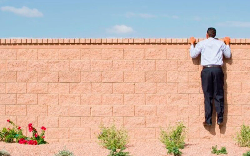 man-climbing-wall